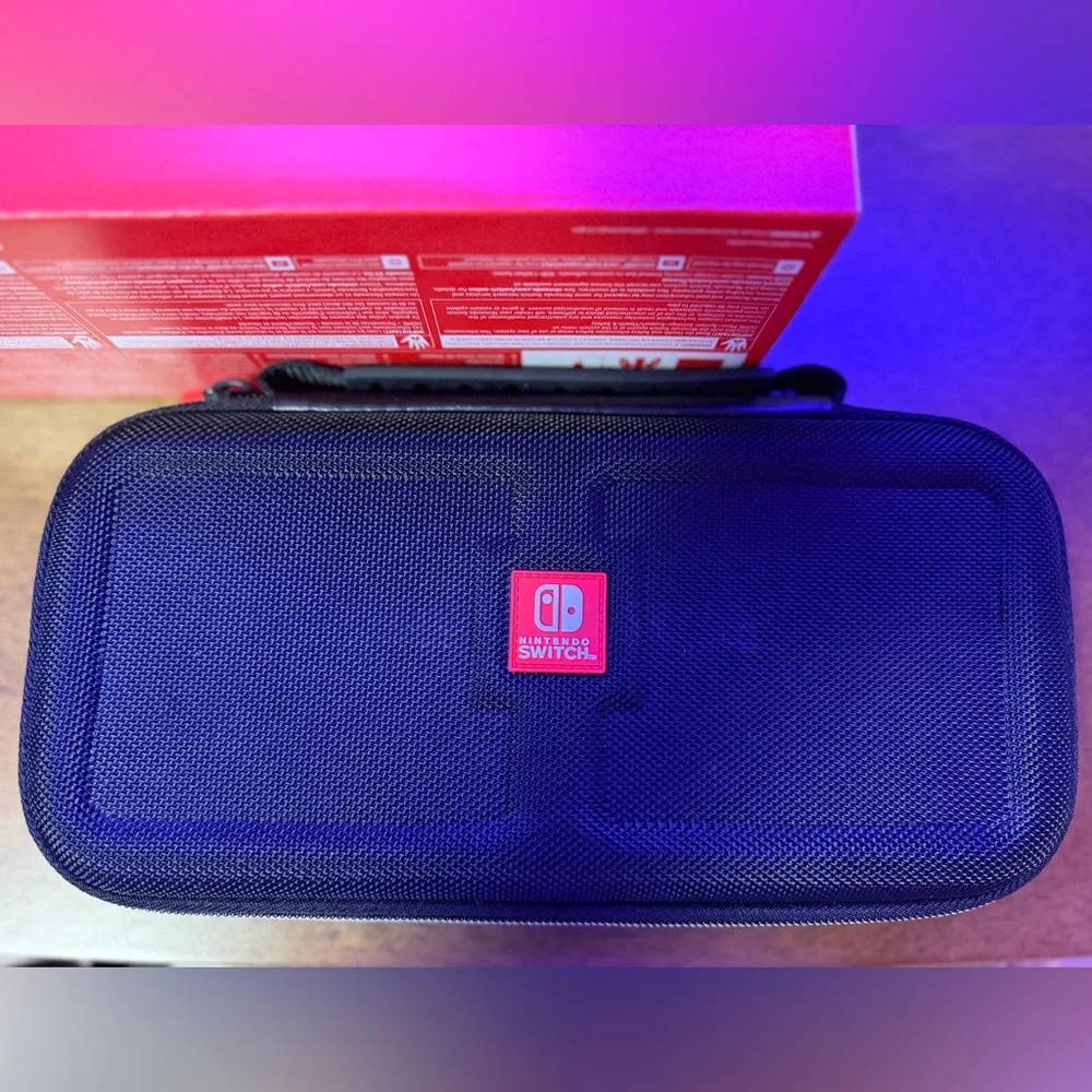 Nintendo Switch Console with Red and Blue Joy-Con